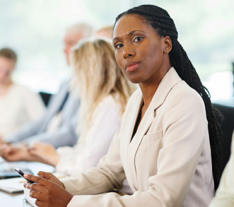 young woman sitting at desk